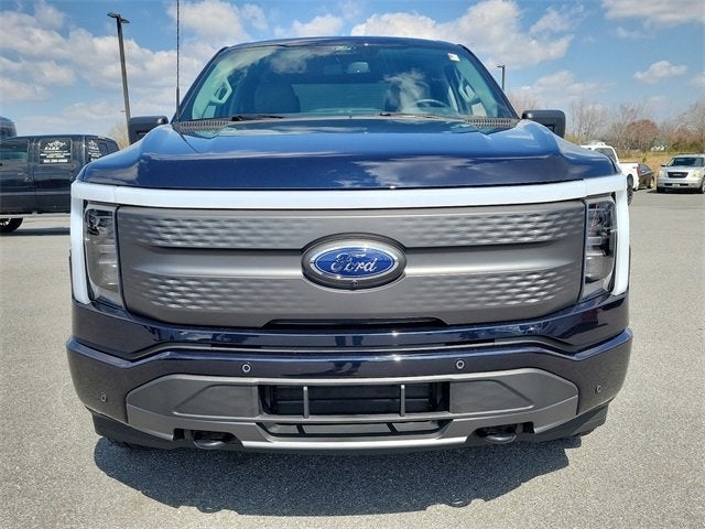 Used 2022 Ford F-150 Lightning XLT with VIN 1FTVW1ELXNWG10294 for sale in Pittsville, MD
